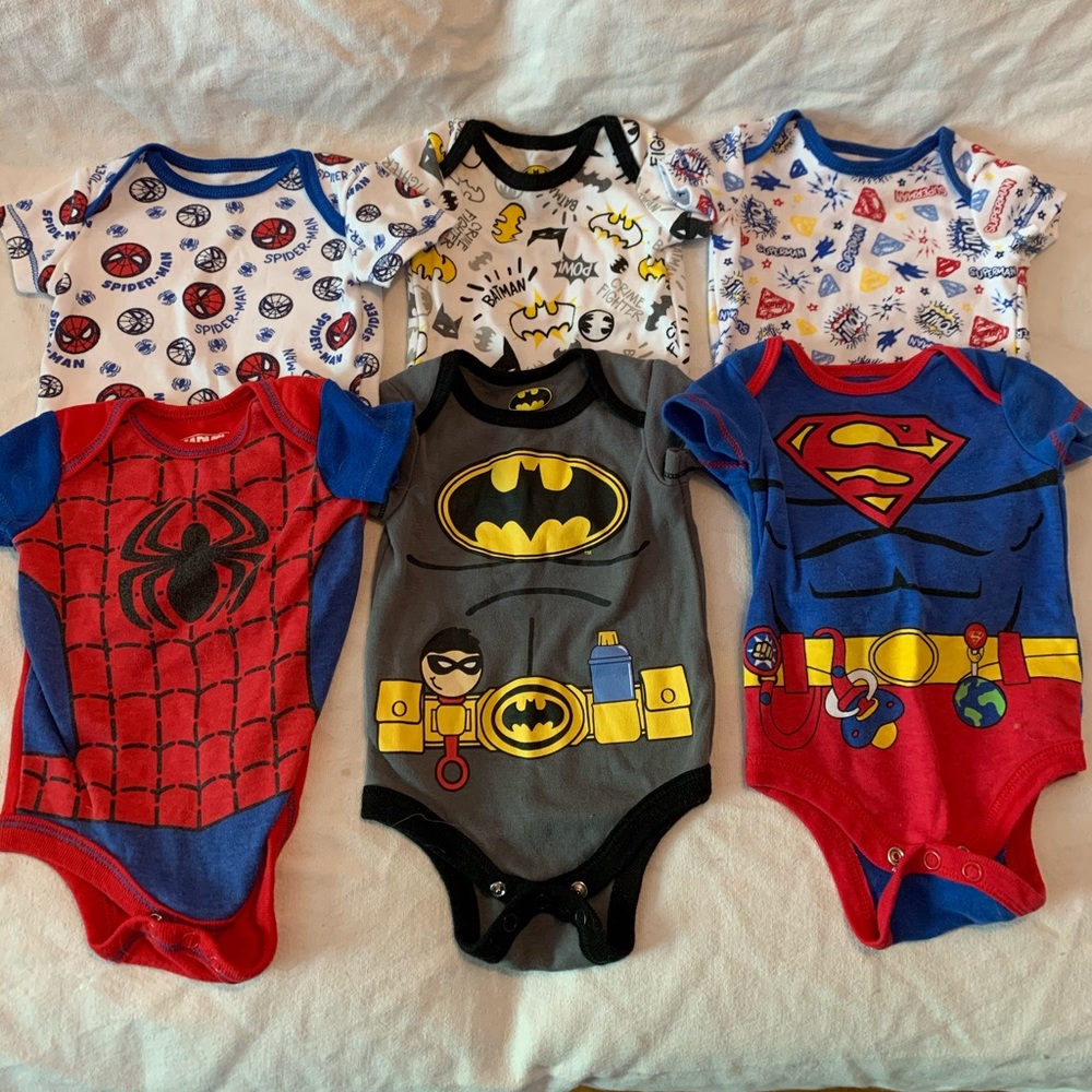 Set of superhero onesies